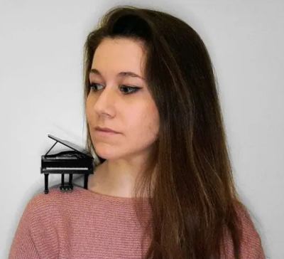 Sara Jasmin Page: At The Piano